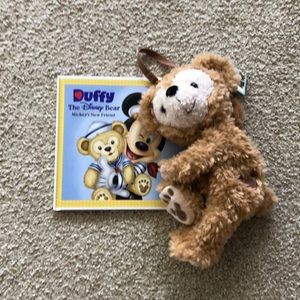 Mickey Mouse and Duffy the bear book and purse